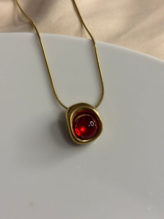 The red diamond necklace