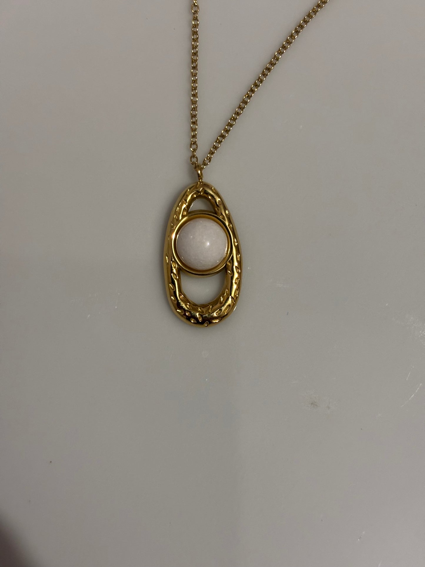 White eye necklace