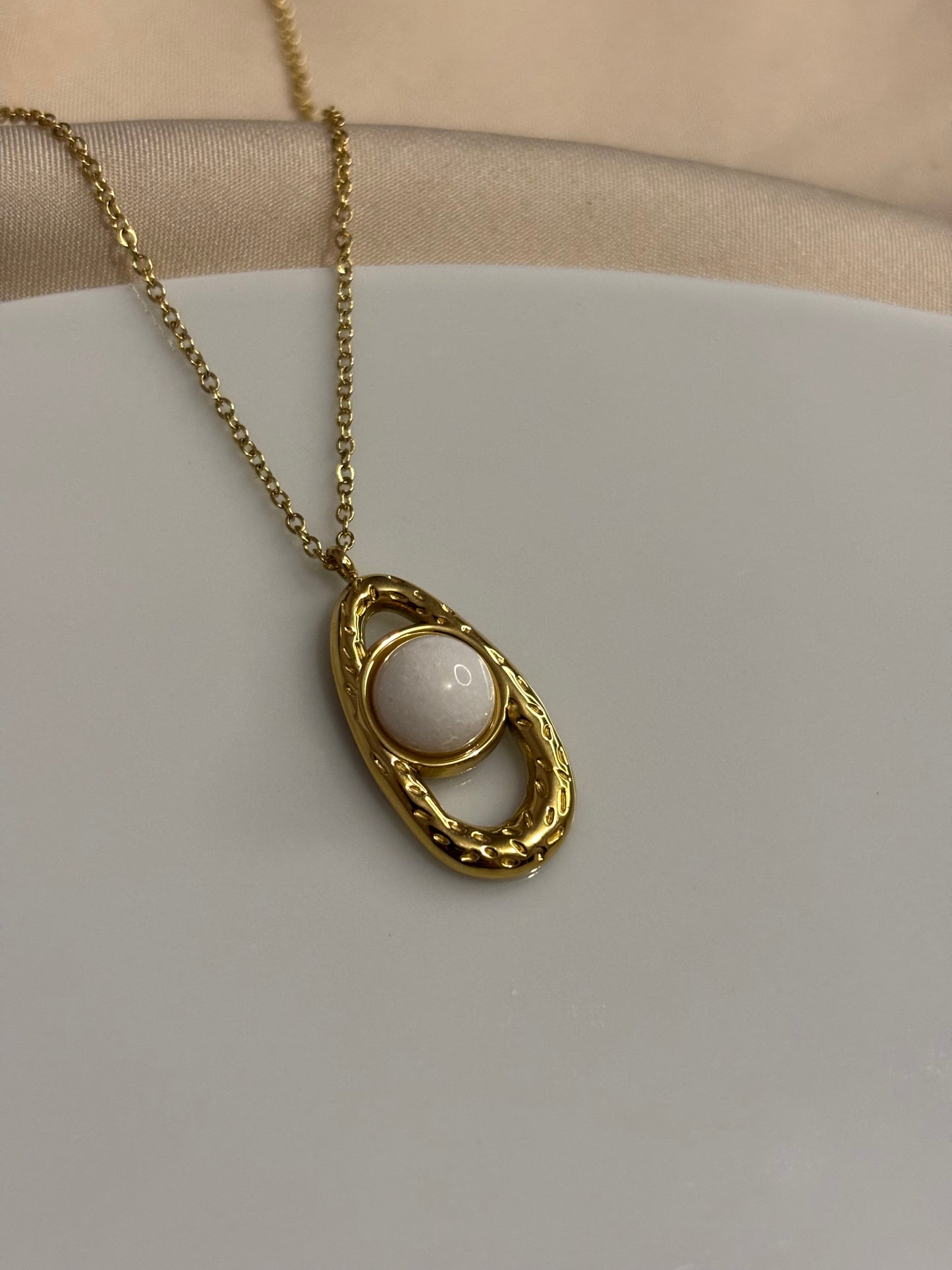White eye necklace